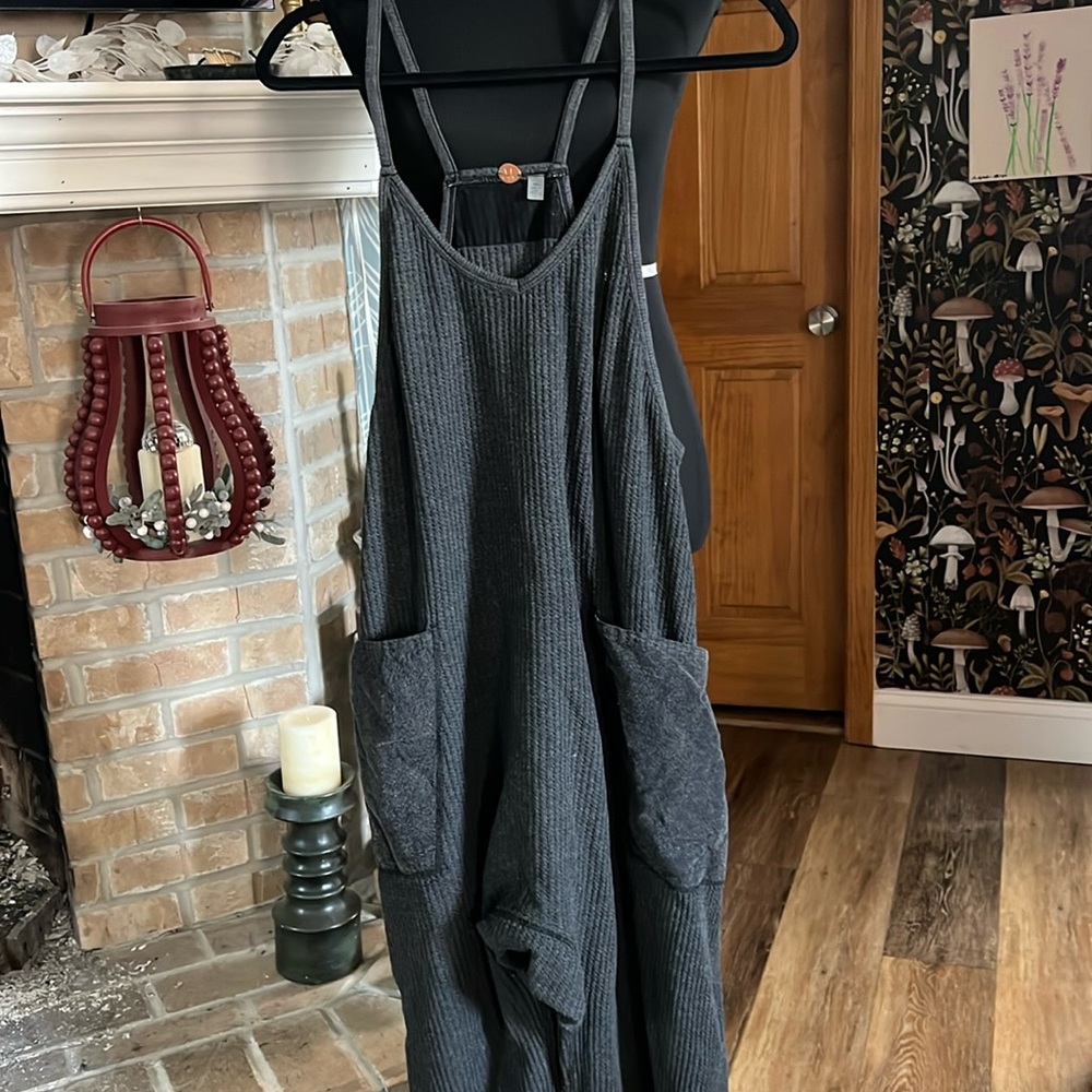 FP One Free People Frankie jumpsuit size Medium color black. Sold out